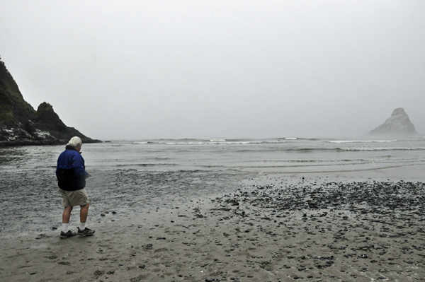 Lee Duquette walking towards the ocean